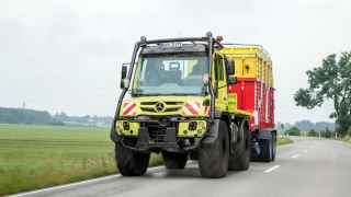 The Unimog with EU tractor registration.